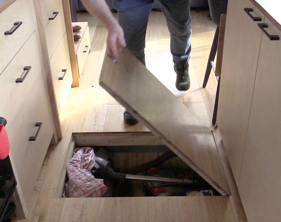 Fred's Tiny Houses pop up roof design for a tiny house on wheels hinged roof