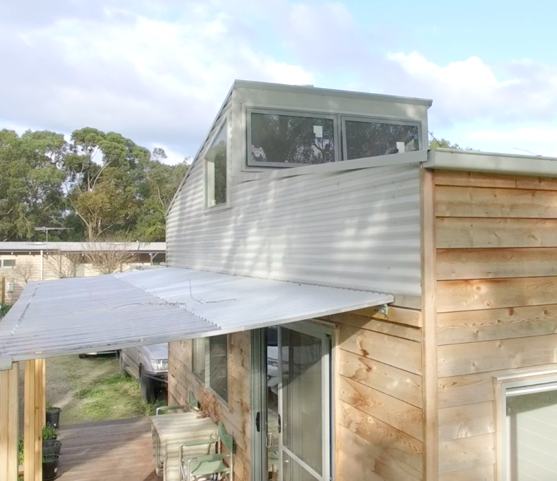 Fred's Tiny Houses pop up roof design for a tiny house on wheels hinged roof
