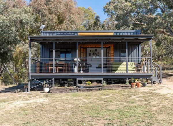 tiny_house_big_deck_french_doors