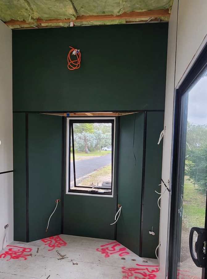 tiny_house-Dark_green_feature_wall_interior