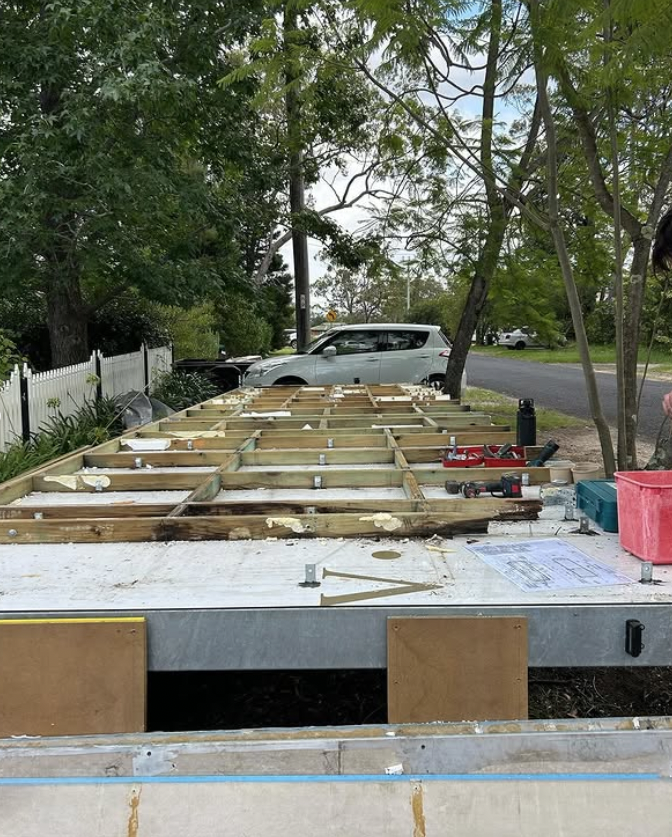 tiny_house_diy_young_couple_build_sub_floor_timber